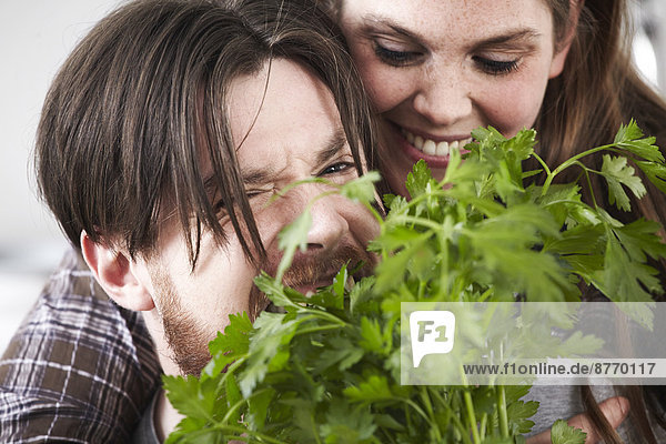 Happy couple with parsley