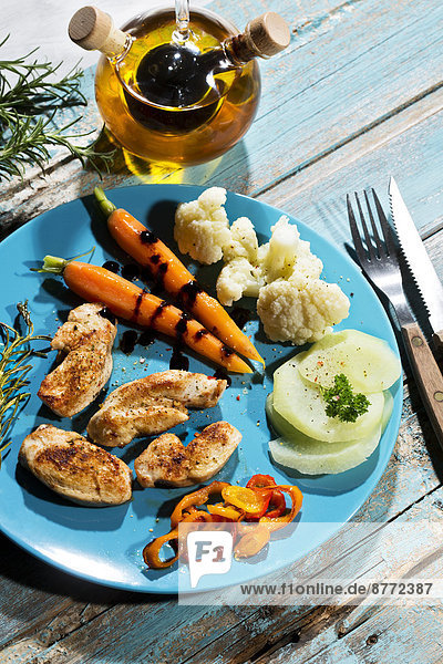 Chicken filets with cauliflower  carrots and bell pepper