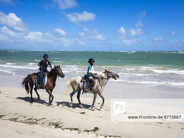 People riding horses on the beach  near Vieux-Fort  Derrière Morne region  Saint Lucia  Leeward Antilles  Lesser Antilles