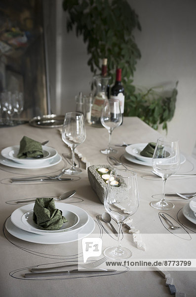 Festive laid table with individual table decoration