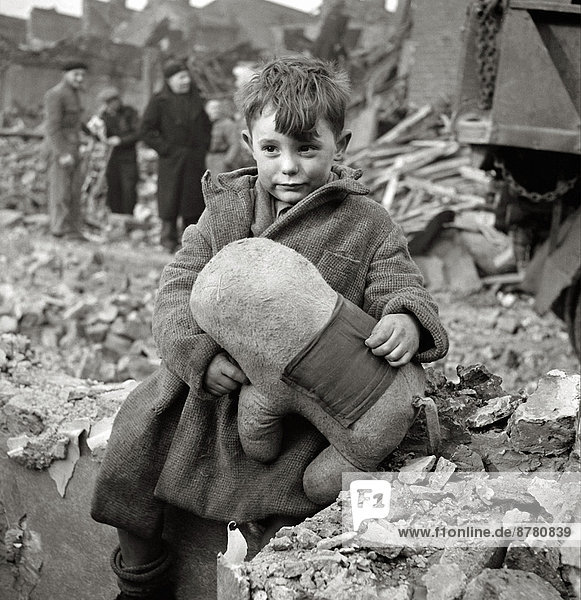WW II  historical  war  world war  second world war  England  boy  soft toy  civilian  ruins  Nazi  National Socialist  air raids  London  1940  destruction