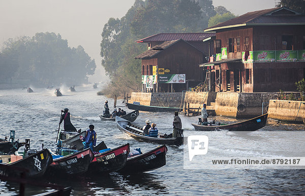 Inle  Myanmar  Burma  Asia  Nyaungshwe  City  boats  colourful  early  lake  morning  canal  touristic  transport  travel