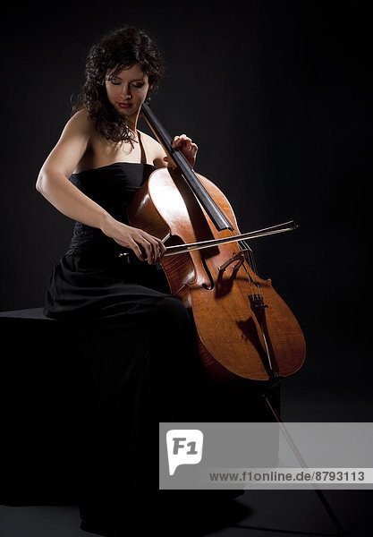 Young Woman Playing Violoncello