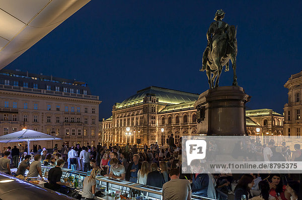 Party on the terrace of the Albertina in the evening  equestrian statue of Archduke Albrecht on the right  Vienna  Vienna State  Austria