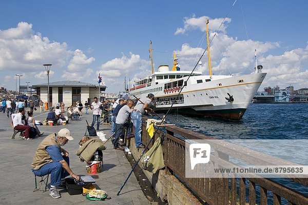 Turkey  Istanbul  Surroundings of Galata bridge  Fishermen                                                                                                                                              