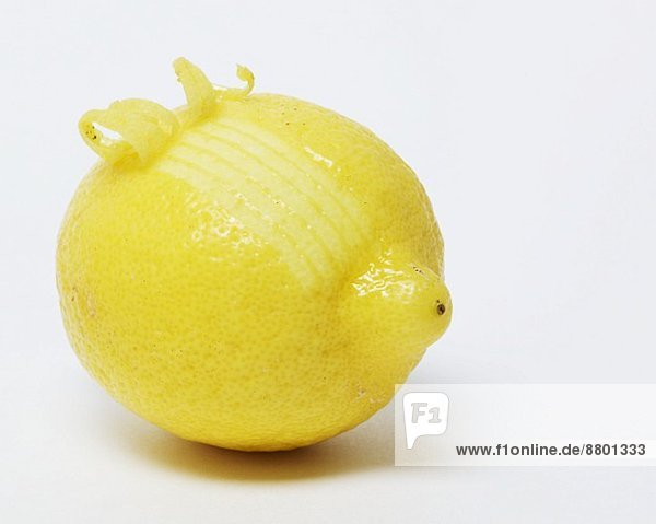 A lemon with curling zest