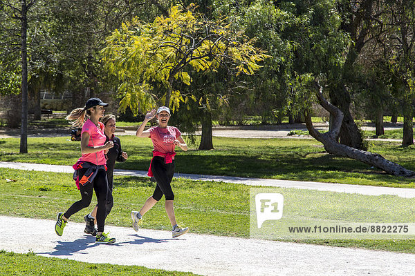 Joggers in the park of Valencia  Province of Valencia  Spain