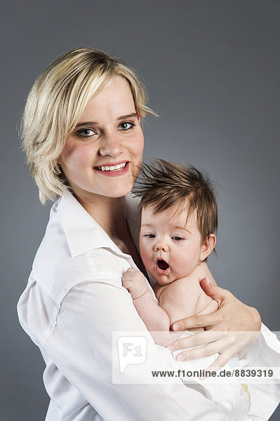 Young mother with baby  5 months  Germany