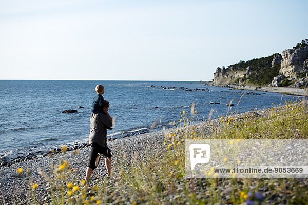 Mother with son on beach  Hall Hangvar  Gotland  Sweden