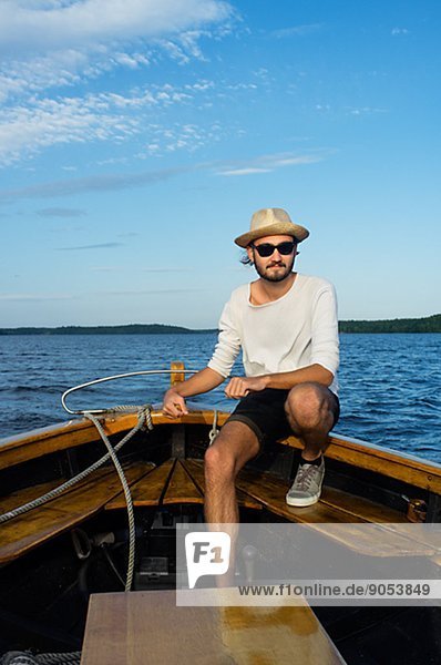 Mid adult man on boat  Sweden