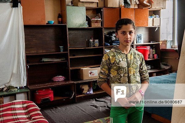 Sofia Bulgaria. Twelve year old Syrian schoolgirl living in Bulgarian refugee camp Vrajdebna without any privacy.
