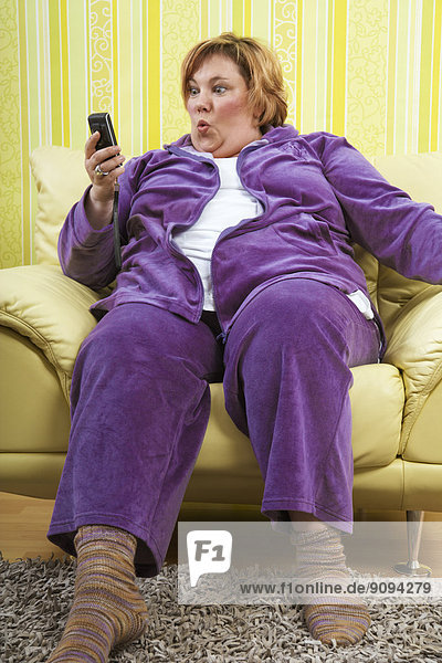 Germany  Mid-adult woman using mobile phone