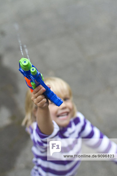 Girl with a water pistol