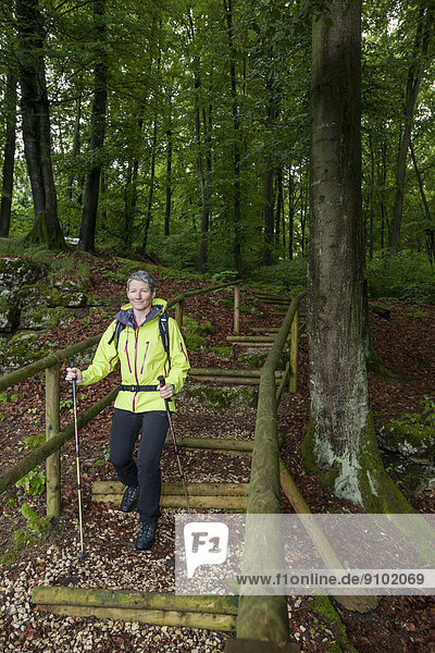 Hiker in a forest  Paulushofen  Beilngries  Bavaria  Germany