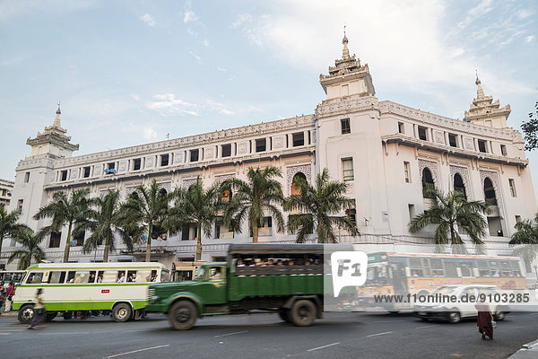 Town Hall traffic on a road Yangon or Rangoon Yangon Region Myanmar