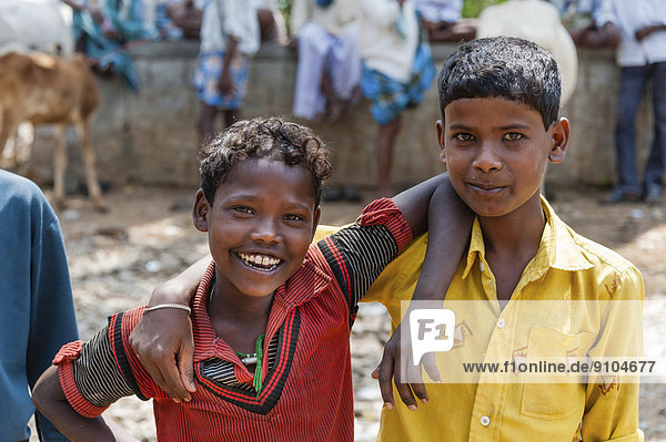 Two smiling Indian children  Begur  Karnataka  India