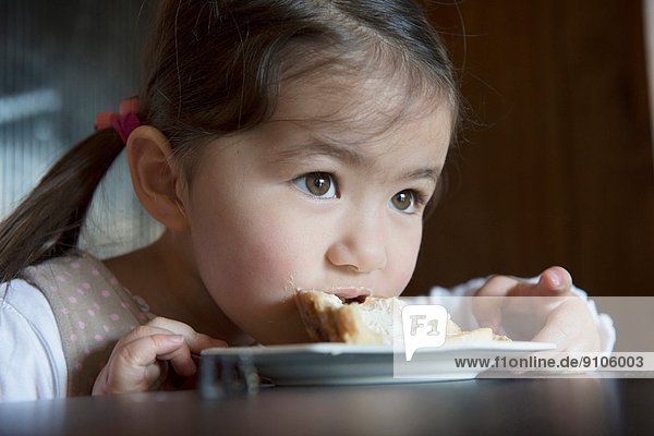 Girl finishing her tart
