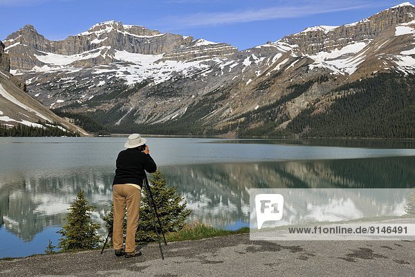 Photographer at Bow Lake  Banff National Park  Alberta  Canada
