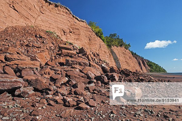 Triassic sedimentary cliffs at Blomidon Provincial Park face constant erosion from Bay of Fundy tides. Minas Basin Nova Scotia.