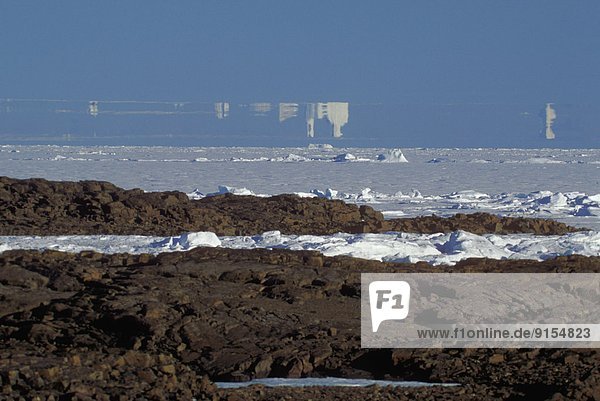 arctic mirage. Ice pieces appear to be floating in the air. Devon Island  Nunavut