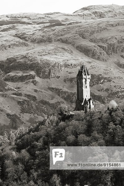 National Wallace Monument standing on a hill overlooking Stirling Castle in Scotland