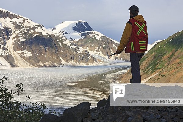 Geologist exploring for minerals  Salmon Glacier area  Stewart  British Columbia