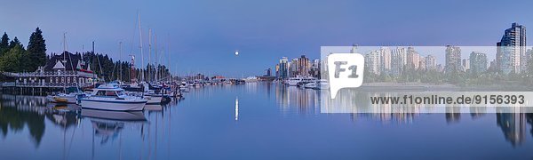 Moon rise over Coal Harbour  Vancouver  Canada