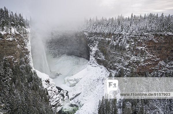 Mist cloud emanating from Helmcken Falls in the winter time in Wells Gray Provincial Park  Clearwater  British Columbia  Canada