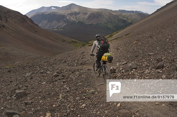 Mountain bike touring in Lorna Pass  Spruce Lake Protected Area. South Chilcotin Mountains. British Columbia  Canada