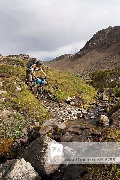 Mountain bike touring in Lorna Pass. Spruce Lake Protected Area. South Chilcotin Mountains. British Columbia  Canada