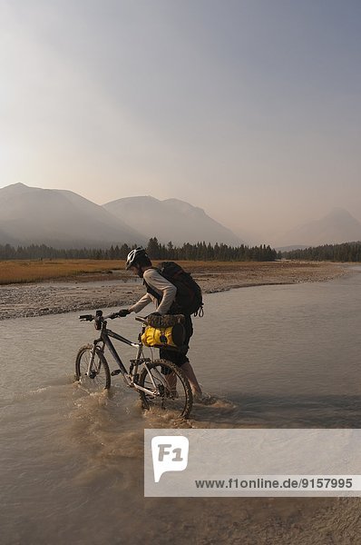 Mountain bike touring in Big Creek. Spruce Lake Protected Area. South Chilcotin Mountains. British Columbia  Canada