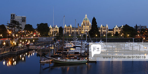 Victoria harbour and illuminated parliament at night  Vancouver Island  Canada
