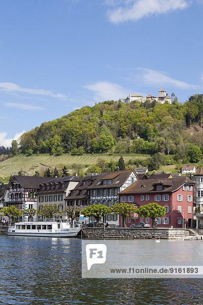 Townscape on the bank of the Rhine River with a boat landing and Burg Hohenklingen Castle  Stein am Rhein  High Rhine  Canton of Schaffhausen  Switzerland