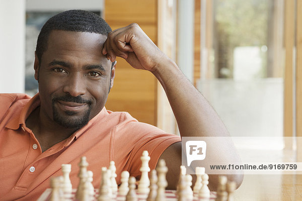 African American man playing chess