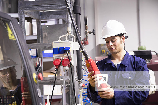 Technician working in a technical room