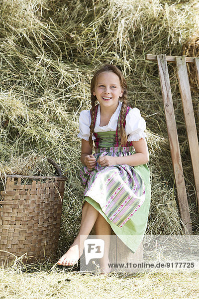 Germany  Bavaria  Girl in traditional dirndl