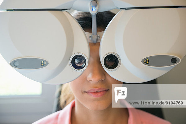 Female patient having eye examination