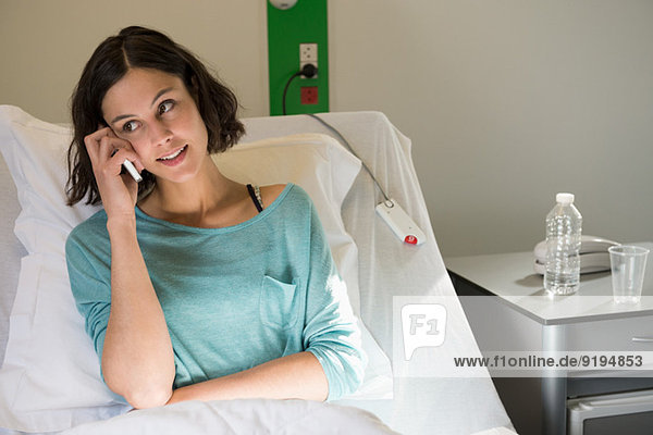 Female patient talking on a mobile phone