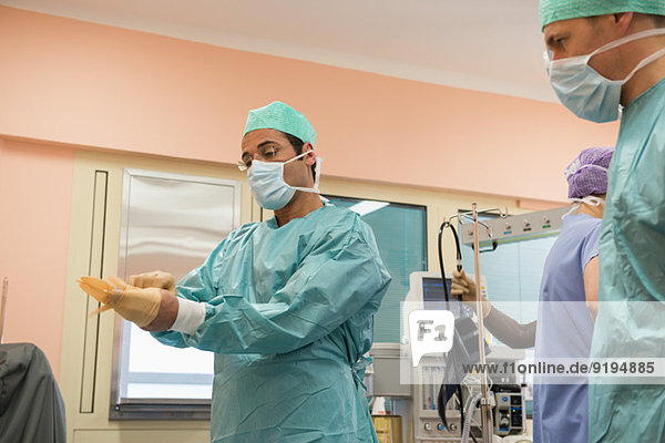 Medical team preparing for an operation in an operating room