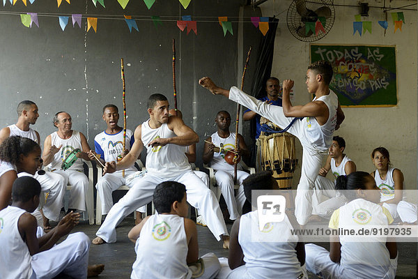 Capoeira  Afro-Brazilian martial dance  in a social project for children and teenagers  slum  Mangueirinha favela  Duque de Caxias  Rio de Janeiro  Brazil