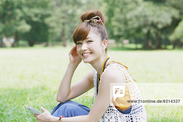 Japanese woman in a park