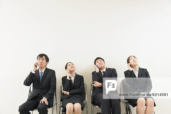 Japanese business people in waiting room