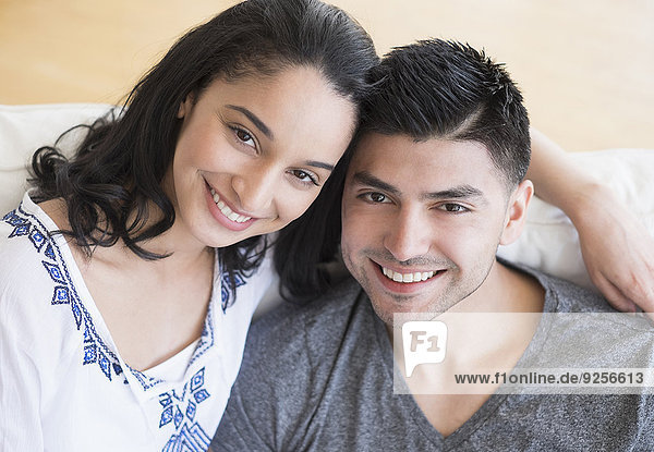 Portrait of happy young couple