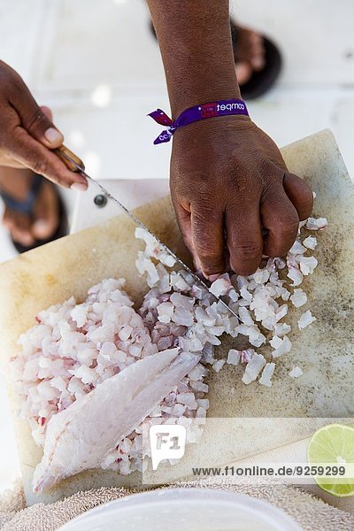 Ceviche being made: fish being diced