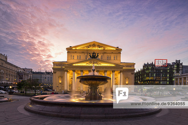 Russia  Central Russia  Moscow  Theatre Square  Bolshoi Theatre and Petrovskiy Fountain in the evening