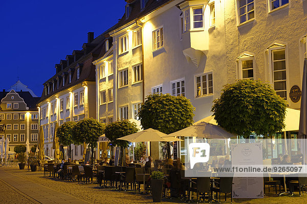 Germany  Bavaria  Swabia  Allgaeu  Kempten  Town hall square and pavement restaurant in the evening