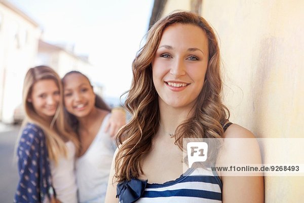 Teenage girl  friends in background