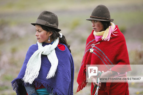 Girls with traditional felt hats  Puruhá people  Kichwa  Chimborazo Province  Ecuador