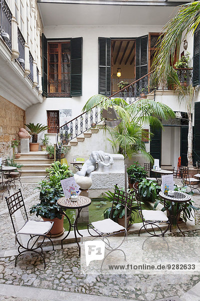 Cafe in a courtyard of the Museu Can Morey de Santa Maria  Palma de Mallorca  Majorca  Balearic Islands  Spain