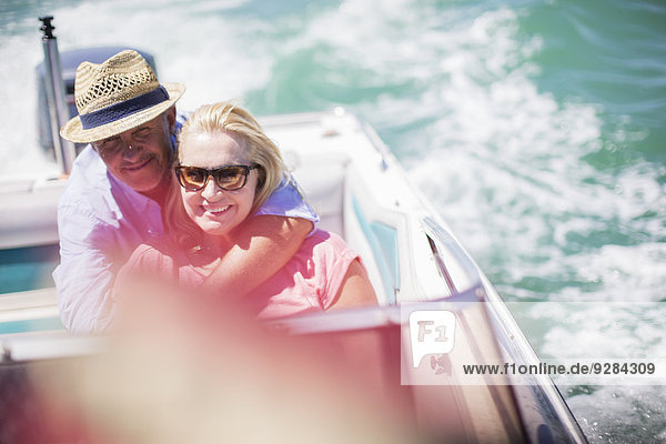 Couple sitting in boat together
